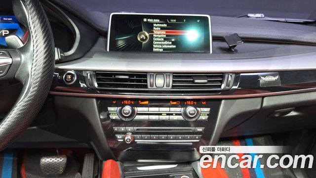 BMW X6 (F16) xDrive 35i 2016 — фото 14
