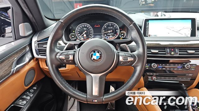 BMW X6 (F16) M50d 2016 — фото 11
