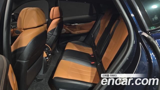 BMW X6 (F16) M50d 2018 — фото 11