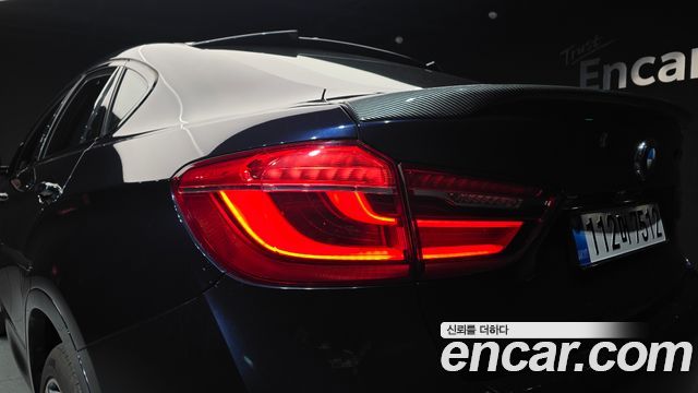 BMW X6 (F16) M50d 2018 — фото 23