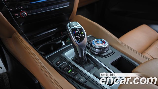 BMW X6 (F16) M50d 2015 — фото 9