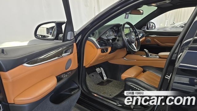BMW X6 (F16) M50d 2015 — фото 10