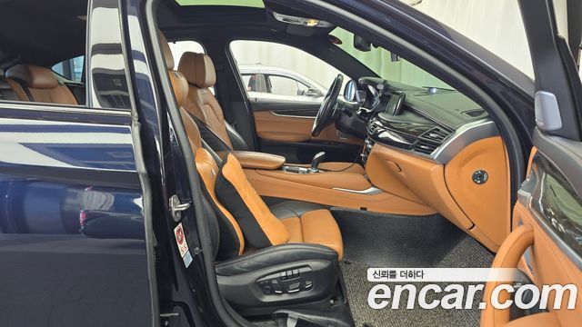 BMW X6 (F16) M50d 2015 — фото 11