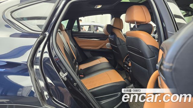 BMW X6 (F16) M50d 2015 — фото 12