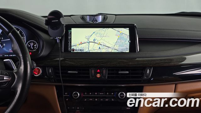 BMW X6 (F16) M50d 2015 — фото 14