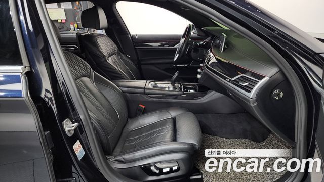 BMW 7 Series (G11) 740Li xDrive M Sport Package 2018 — фото 11