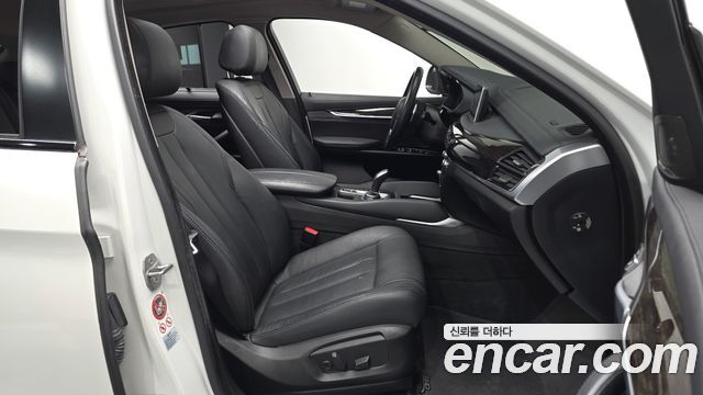 BMW X6 (F16) xDrive 30d 2016 — фото 11