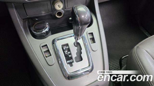 KG Mobility (SsangYong) Korando Turismo 2WD GT 11-seater 2014 — фото 9