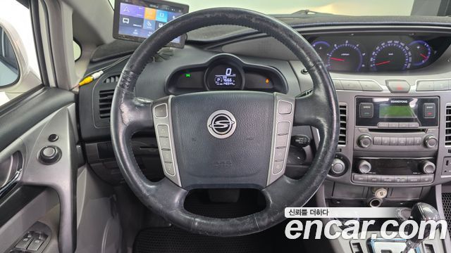 KG Mobility (SsangYong) Korando Turismo 2WD GT 11-seater 2014 — фото 13