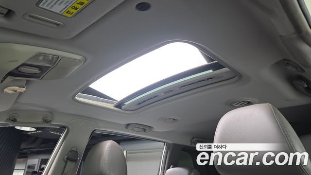 KG Mobility (SsangYong) Korando Turismo 2WD GT 11-seater 2014 — фото 16