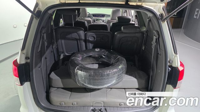 KG Mobility (SsangYong) Korando Turismo 2WD GT 11-seater 2014 — фото 20