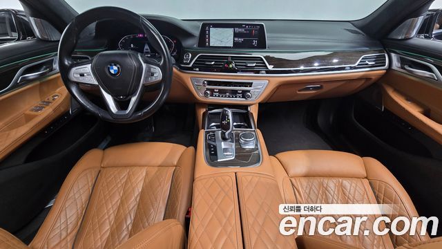 BMW 7 Series (G11) 740Li xDrive Design Pure Excellence 2022 — фото 7