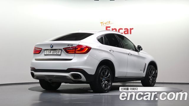 BMW X6 (F16) xDrive 40d 2015 — фото 2