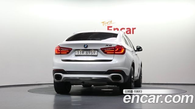 BMW X6 (F16) xDrive 40d 2015 — фото 4