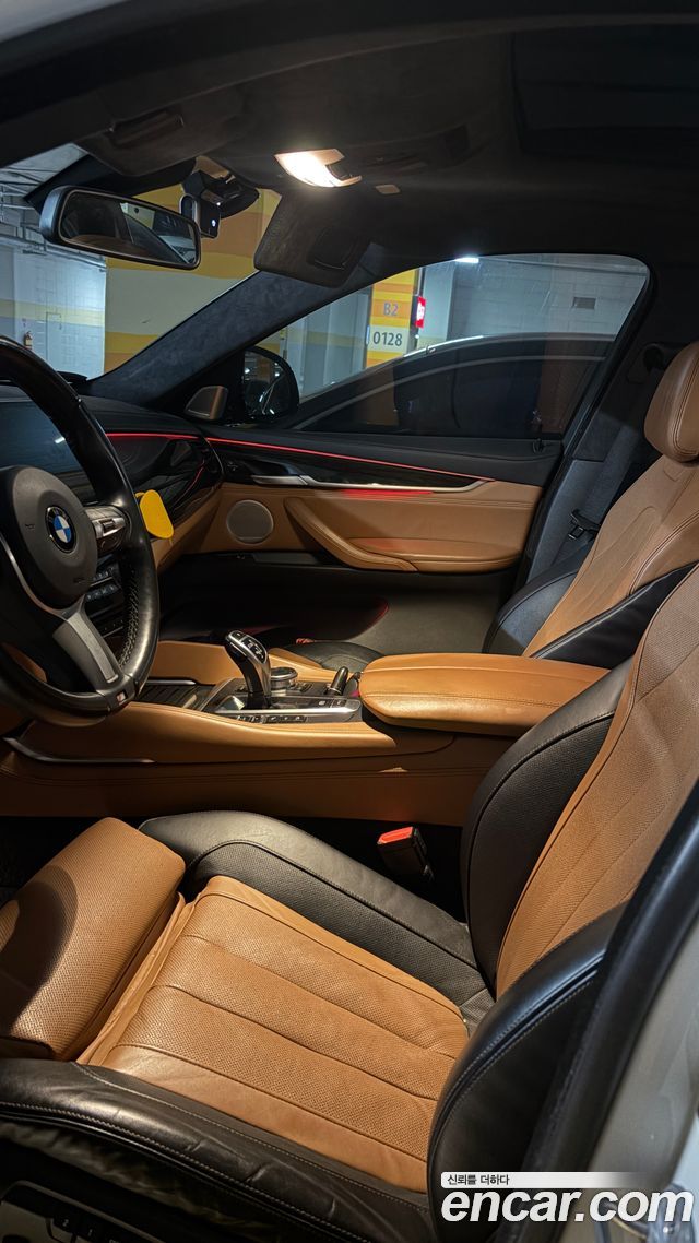 BMW X6 (F16) M50d 2018 — фото 8