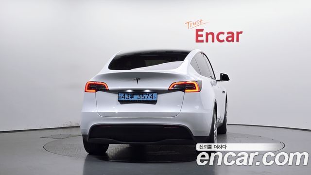 Tesla Model Y RWD 2024 — фото 4