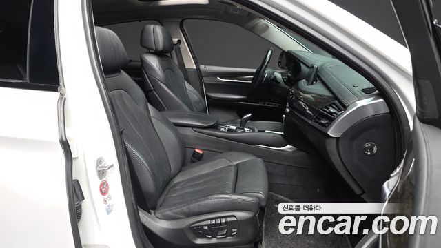 BMW X6 (F16) xDrive 40d 2016 — фото 11