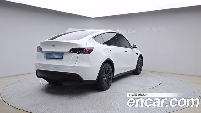 Tesla Model Y RWD 2024 — фото 2