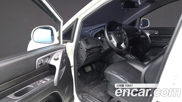 KG Mobility (SsangYong) Korando Turismo 4WD Outdoor Edition 9-seater 2017 — фото 11