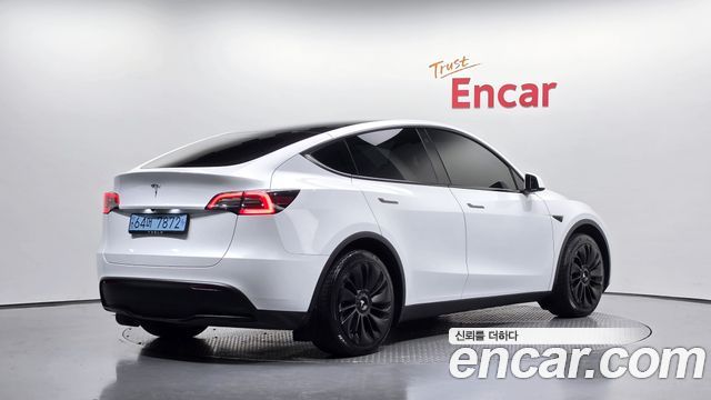 Tesla Model Y RWD 2024 — фото 2