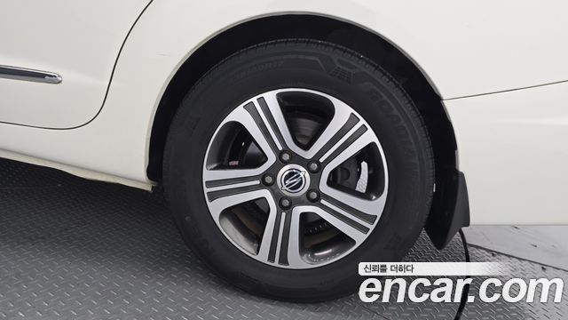 KG Mobility (SsangYong) Korando Turismo 4WD GT 11-seater 2014 — фото 5