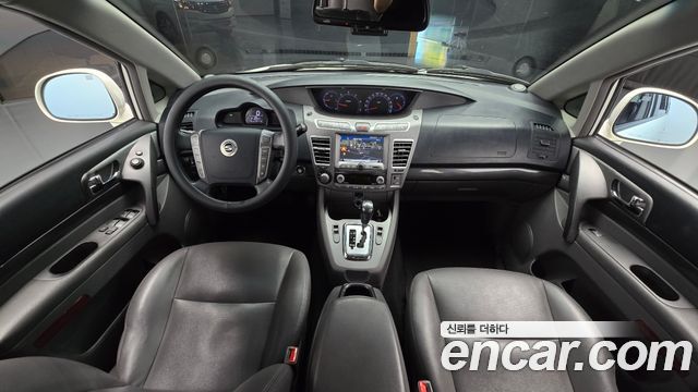 KG Mobility (SsangYong) Korando Turismo 4WD GT 11-seater 2014 — фото 7