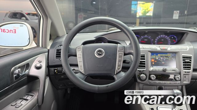 KG Mobility (SsangYong) Korando Turismo 4WD GT 11-seater 2014 — фото 16