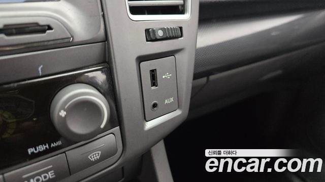 KG Mobility (SsangYong) Korando Turismo 4WD GT 11-seater 2014 — фото 23