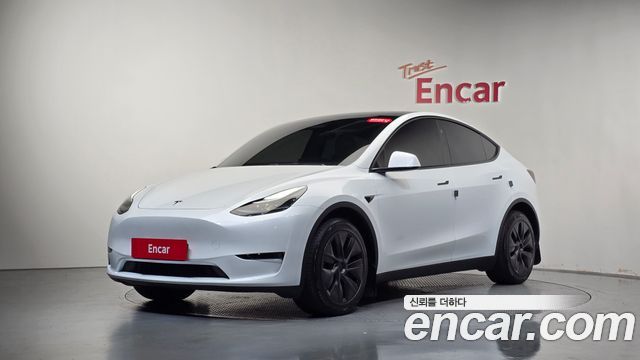 Tesla Model Y Long Range AWD 2024 — фото 11