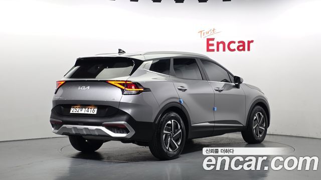 Kia Sportage Hybrid (V) Prestige 2023 — фото 2