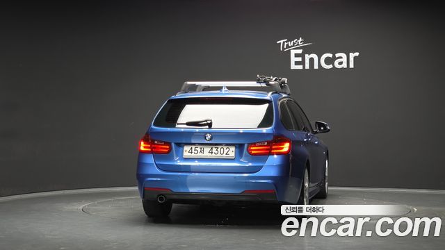 BMW 3 Series (F30) 320d Touring M Sport 2014 — фото 4
