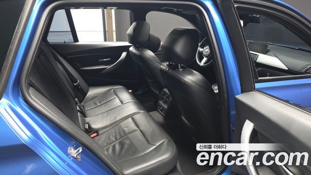 BMW 3 Series (F30) 320d Touring M Sport 2014 — фото 12