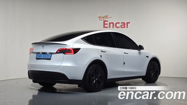 Tesla Model Y RWD 2024 — фото 2