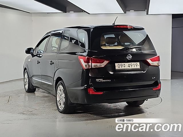 KG Mobility (SsangYong) Korando Turismo 4WD LT 11-seater 2014 — фото 3