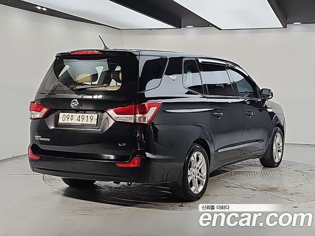 KG Mobility (SsangYong) Korando Turismo 4WD LT 11-seater 2014 — фото 4