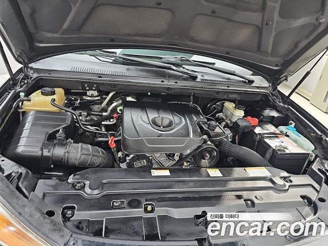 KG Mobility (SsangYong) Korando Turismo 4WD LT 11-seater 2014 — фото 6