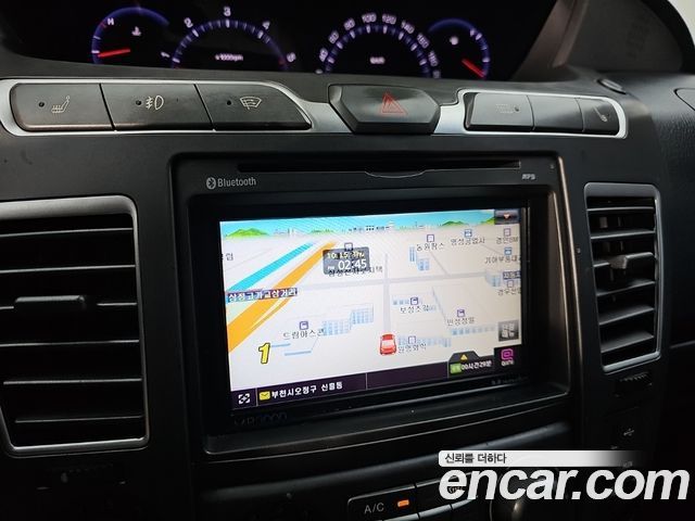KG Mobility (SsangYong) Korando Turismo 4WD LT 11-seater 2014 — фото 17