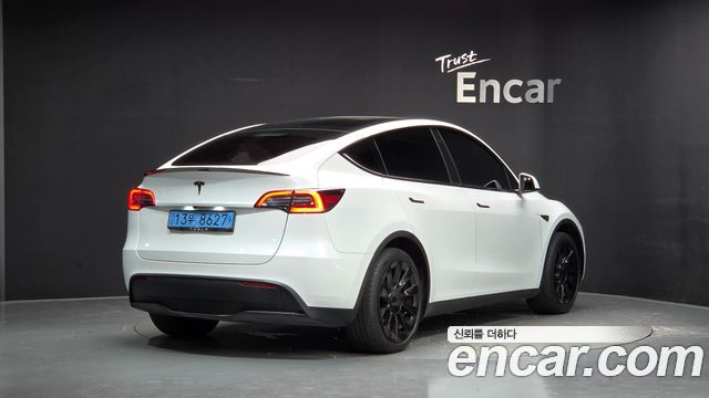 Tesla Model Y RWD 2023 — фото 2