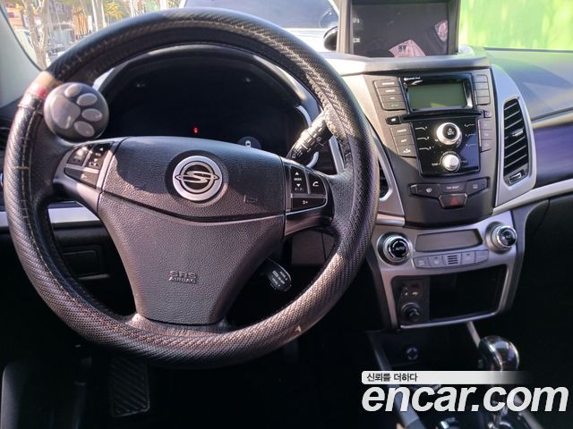 KG Mobility (SsangYong) Korando C 2.0 CVT 2WD Deluxe 2014 — фото 17