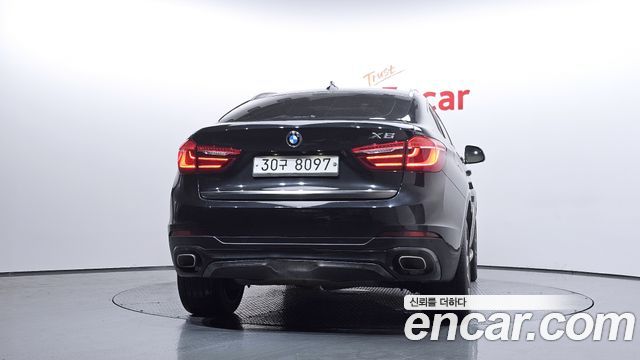 BMW X6 (F16) xDrive 40d 2015 — фото 4