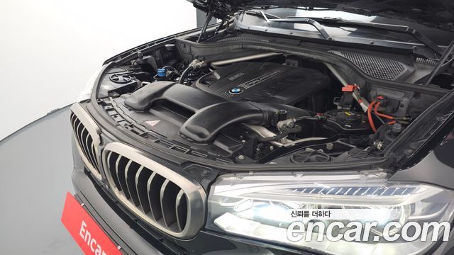 BMW X6 (F16) xDrive 40d 2015 — фото 6