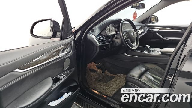 BMW X6 (F16) xDrive 40d 2015 — фото 10