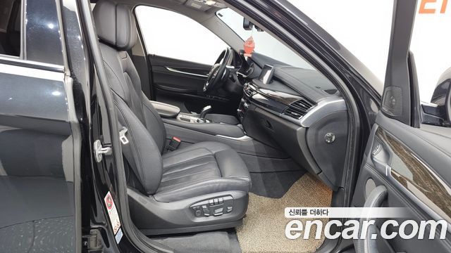 BMW X6 (F16) xDrive 40d 2015 — фото 11