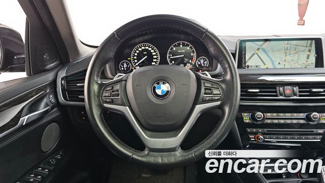 BMW X6 (F16) xDrive 40d 2015 — фото 13