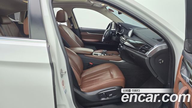 BMW X6 (F16) xDrive 30d 2015 — фото 11