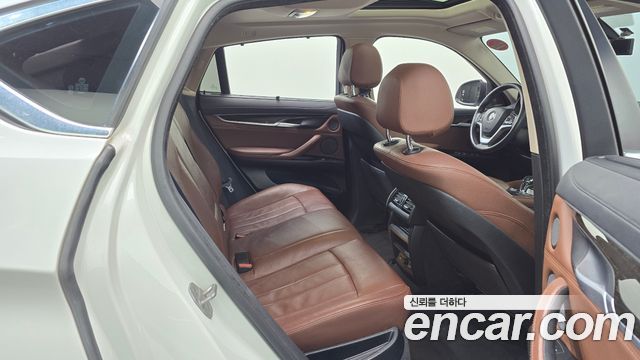 BMW X6 (F16) xDrive 30d 2015 — фото 12