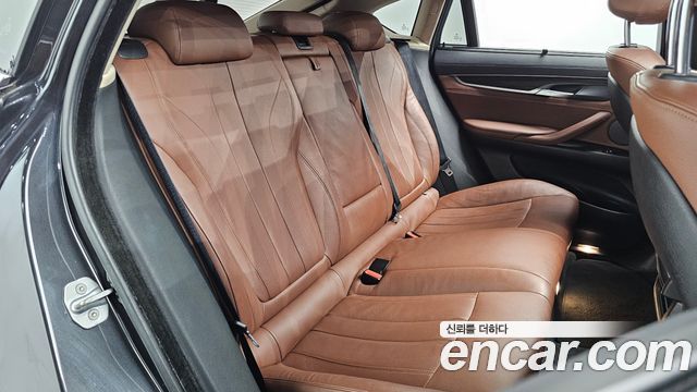 BMW X6 (F16) xDrive 30d 2015 — фото 12