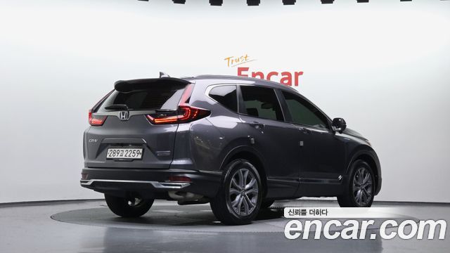 Honda CR-V (V) 2.0 Hybrid Touring 4WD 2022 — фото 2