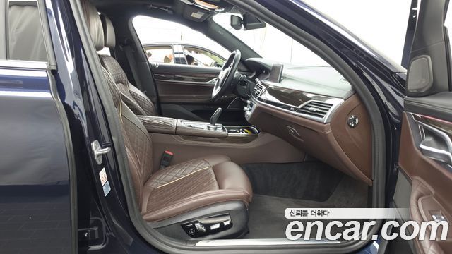 BMW 7 Series (G11) 745e iPerformance Design Pure Excellence 2020 — фото 15