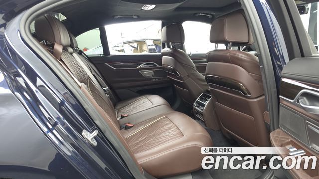 BMW 7 Series (G11) 745e iPerformance Design Pure Excellence 2020 — фото 16